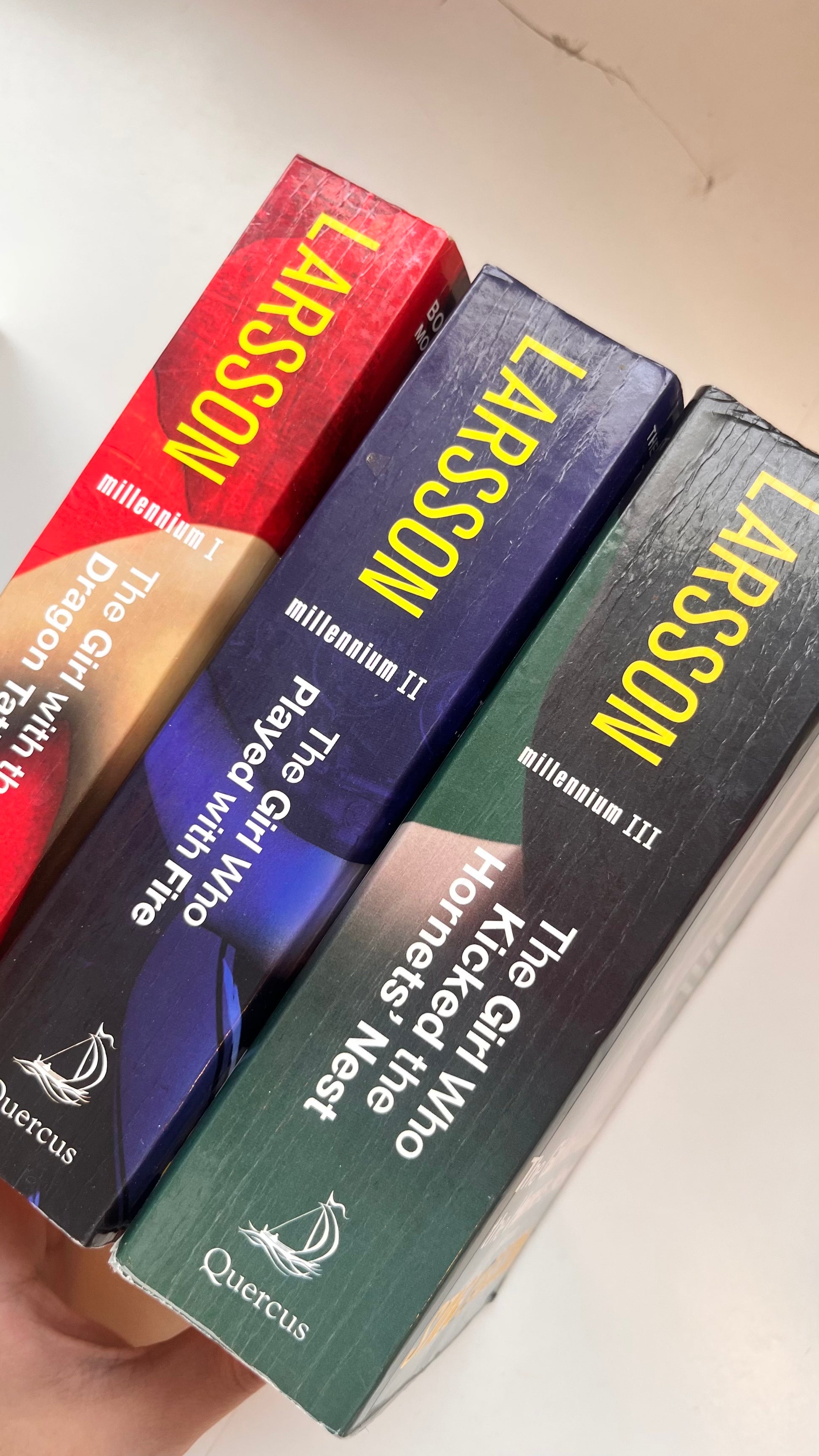 The Girl with the Dragon Tattoo trilogy by Stieg Larsson paperback – crime thriller series available at Preloved Books UAE

