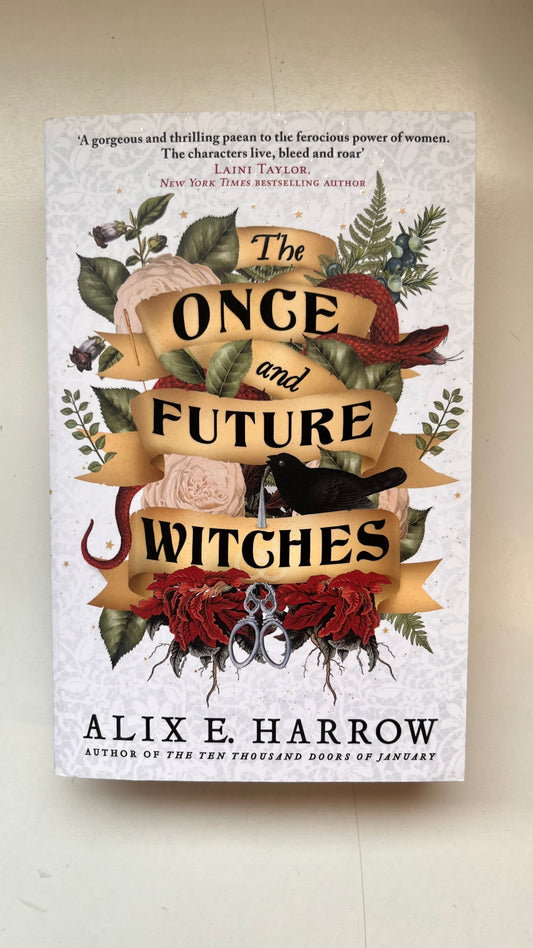 Book cover of 'The Once and Future Witches' by Alix E. Harrow on a beige background