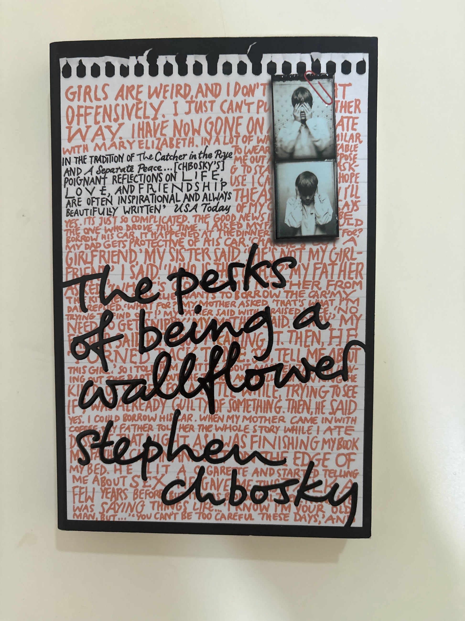 Book cover of 'The Perks of Being a Wallflower' by Stephen Chbosky with text and black border.