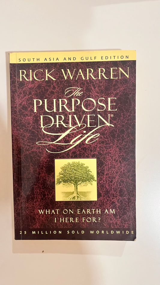 Inspirational cover of The Purpose Driven Life by Rick Warren with tree imagery symbolizing growth.

