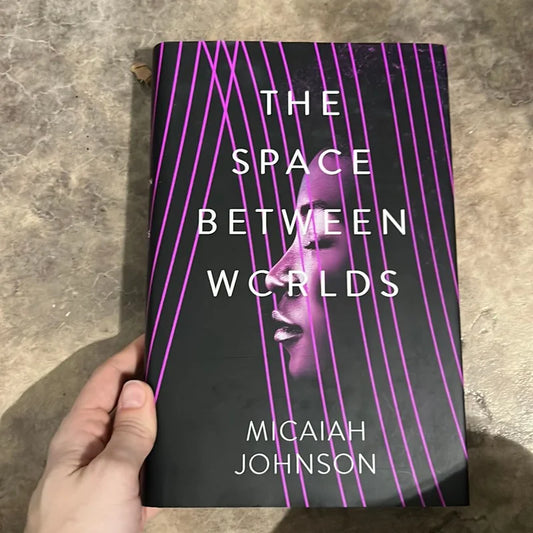 The Space Between Worlds – Multiverse mystery and identity exploration.