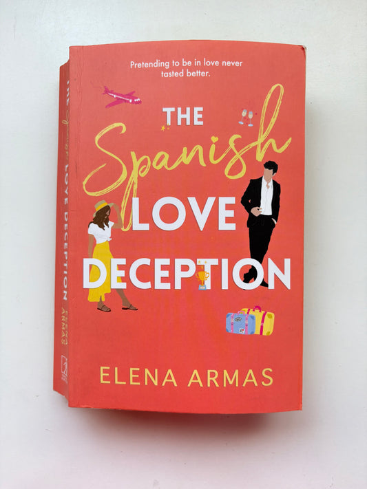 Book titled 'The Spanish Love Deception' by Elena Armas on a white background