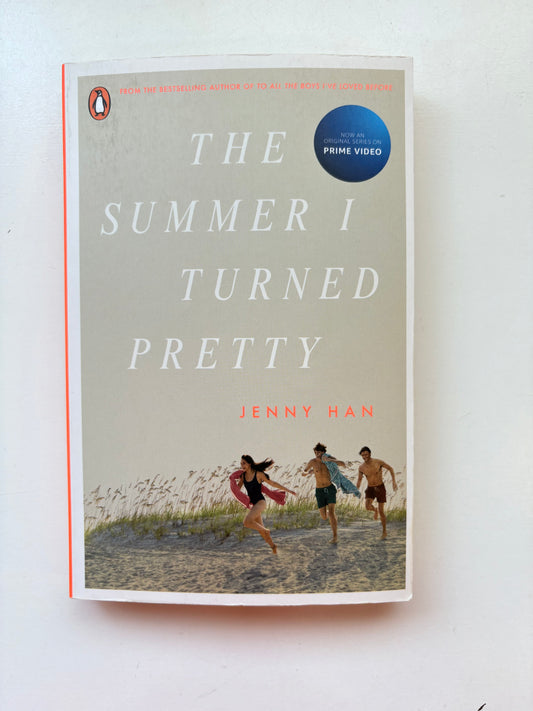 Book titled 'The Summer I Turned Pretty' by Jenny Han on a white background