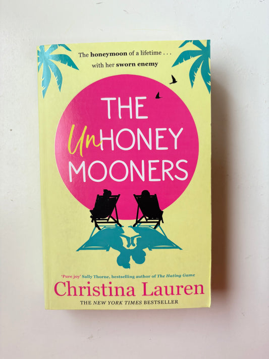 Book cover of 'The Unhoneymooners' by Christina Lauren on a light background